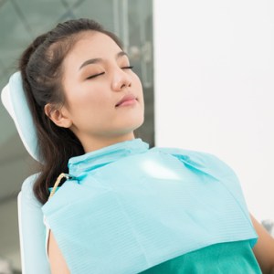 relaxed patient in dental chair